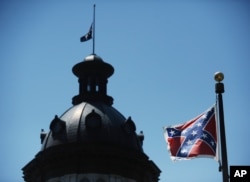 The Confederate flag flies near the South Carolina Statehouse in Columbia, S.C., June 19, 2015.