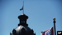 The Confederate flag flies near the South Carolina Statehouse in Columbia, S.C., June 19, 2015.