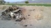 Photo taken on cellphone purports to show the destroyed vehicle in which Mullah Mohammad Akhtar Mansour was traveling in the Ahmad Wal area in Baluchistan province of Pakistan, near Afghanistan's border, May 22, 2016.