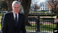 FILE - Special Counsel Robert Mueller in Washington, March 24, 2019. 