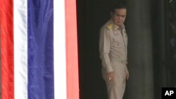 Thai Prime Minister Prayuth Chan-o-cha arrives at the government house in Bangkok, Thailand, Monday, Aug. 8, 2016.