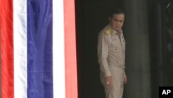 FILE - Thai Prime Minister Prayuth Chan-ocha arrives at the government house in Bangkok, Thailand, Monday, Aug. 8, 2016.