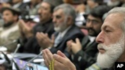 د افغانستان د پارلیمان یو منظر. د پارلیمان نوي منتخت شوې غړو غوښتنه کړې چې نوي وولسي جرگه دې په رسمي توگه پرانستلی شي