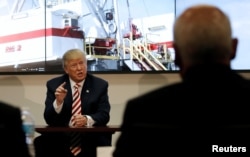 Republican presidential nominee Donald Trump meets with energy executives during a campaign stop in Denver, Colorado, Oct. 4, 2016.