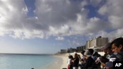 นักวิทยาศาสตร์นานาชาติศึกษาพบว่า อนุภาคไอละอองในบรรยากาศชั้นบนที่หุ้มห่อโลกช่วยชะลออัตราภาวะโลกร้อน