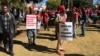 Members of the Movement for Democratic Change Alliance are planning to protest July 25, 2018, in Harare to force the Zimbabwe Electoral Commission to give in to their demands. Here, protesters accuse the elections body of plotting to rig the vote for the ruling Zanu PF party, July 11, 2018. (S. Mhofu/VOA)