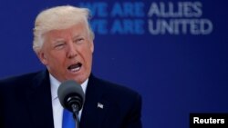 FILE - U.S. President Donald Trump attends a NATO summit at the NATO headquarters in Brussels, Belgium, May 25, 2017.