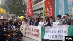 泛民政團團體星期三到灣仔警察總部示威 （蘋果日報網站截圖）