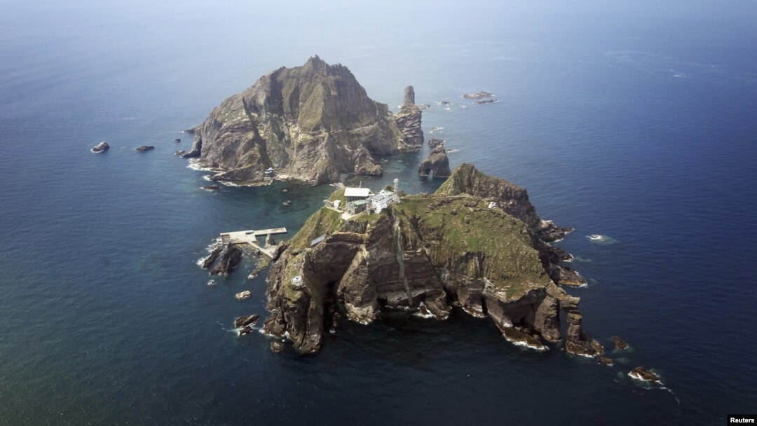 A set of remote islands called Dokdo in Korean and Takeshima in Japanese is seen in this picture taken from a helicopter August 10, 2012. 
