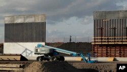 The first panels of levee border wall are seen at a construction site along the U.S.-Mexico border, Nov. 7, 2019, in Donna, Texas. 