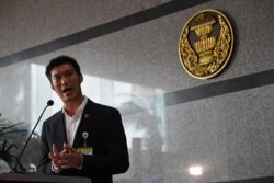 FILE - Future Forward Party leader Thanathorn Juangroongruangkit speaks to the media before the parliamentary vote for Thailand’s new prime minister in Bangkok, June 5, 2019.