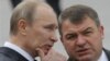 Отставка Сердюкова: что стоит за решением Путина?