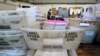 Chester County election workers scan mail-in and absentee ballots at West Chester University, in West Chester, Pennsylvania.