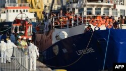 The "MV Lifeline", a vessel for the German charity Mission Lifeline, arrives with 234 migrants onboard in the harbor of Valletta, Malta, June 27, 2018.