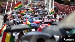 Médicos y empleados del sector Salud marchan en protesta contra el presidente de Bolivia, Evo Morales, en La Paz, el 22 de octubre de 2019. Reuters.