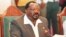 FILE - Angolan Jonas Savimbi holds a joint statement at the media conference in Umtata in the Eastern Cape, Jan. 8, 1997. 