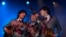 A Beatles tribute band plays at the dilapidated Washington Coliseum on the 50th anniversary of The Beatles' first North American performance at the venue in Washington, Feb. 11, 2014.