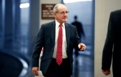 FILE - Sen. Jim Risch, R-Idaho, arrives for a vote on Capitol Hill, May 17, 2018, in Washington.