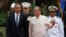 U.S. President Barack Obama, left, walks with Philippines President Benigno Aquino III at Malacanang Palace in Manila, the Philippines, April 28, 2014. 