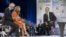 President Barack Obama participates in a town hall hosted by Univision and Univision news anchors Jorge Ramos (L) and Maria Elena Salinas (C), at the University of Miami, Florida, September 20, 2012.