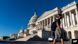 The Dome of the US Capitol is seen as Congress and the White House grapple with a stopgap bill to avert a government and a $3.5 trillion government overhaul that is key to President Joe Biden's domestic agenda, Sept. 30, 2021.