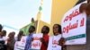 FILE - Sudanese journalists protest against restrictions on media freedom, at the headquarters of the National Council for Press and Publications, in Sudan's capital Khartoum, Nov. 15, 2017.