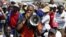  A mineworker addresses his colleagues before taking part in a march outside the Anglo American mine in South Africa's North West Province, September 12, 2012. 