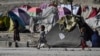 Aid Group: 2 Afghan Children Die as Families Flee Taliban Demolition of Refugee Camp 
