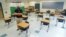 Fairfax County Public Schools assistant director of facilities management Todd Jones stands in a classroom where desks have been spaced to prevent the spread of the coronavirus disease (COVID-19) at Mantua Elementary School in Fairfax, Virginia, U.S., July 17, 2020.  REUTERS