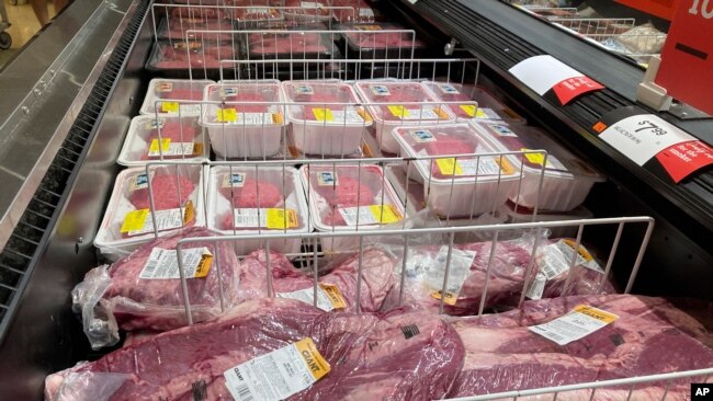 FILE - Meat products at a grocery store in Roslyn, Pa., June 15, 2021.