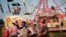 People attend a county fair Aug. 6, 2021, in Rolla, Missouri. The state health department says only a little more than 4 in 10 Missourians have received the COVID vaccine as the pandemic continues to infect thousands.