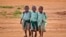 FILE - Young schoolboys walk home in the village of Nyumbani, Kenya, which caters to children who lost their parents to HIV, and grandparents who lost their children to HIV.
