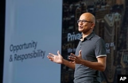 FILE - Microsoft CEO Satya Nadella delivers the keynote address at Build, the company's annual conference for software developers, May 7, 2018, in Seattle.