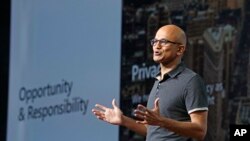 Microsoft CEO Satya Nadella delivers the keynote address at Build, the company's annual conference for software developers, May 7, 2018, in Seattle. 