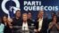 Parti Quebecois leader Pauline Marois stands with her family after winning a minority government in the Quebec provincial election in Montreal, Quebec, September 4, 2012. 