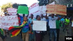 FILE: Some of the protesting NRZ workers in Harare on Friday, May 20, 2016. (Photo: Thomas Chiripasi)