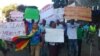 FILE: Some of the protesting NRZ workers in Harare on Friday, May 20, 2016. (Photo: Thomas Chiripasi)