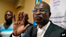"Nous attendons que tous les électeurs votent, sinon nous n'accepterons pas ces élections", a lancé Martin Fayulu après avoir voté à Kinshasa.