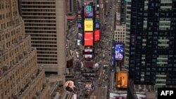 FILE - A general views shows Times Square ahead of the December 31 New Year's celebration in New York City, on December 30, 2023. (Photo by Yuki IWAMURA / AFP)