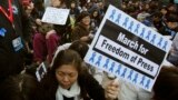 FILE - Protesters sit outside the office of Hong Kong's Chief Executive during a demonstration demanding for freedom of speech and press freedom in Hong Kong.