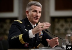 FILE - Gen. John Nicholson, the top U.S. commander in Afghanistan, testifies on Capitol Hill in Washington, Feb. 9, 2017, before the Senate Armed Services Senate Committee.