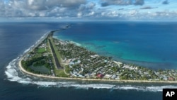 FILE - Tuvalu, shown in this undated photo, is among Pacific atoll islands threatened with rising sea levels, according to a World Bank study released on Nov. 14, 2024. (Rising Nations Initiative via AP)