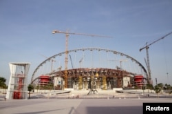 FILE - A view of the construction work at the Khalifa International Stadium in Doha, Qatar, March 26, 2016.