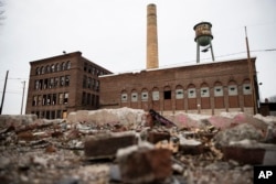 Rubble lies in front of a derelict building in Wilkes-Barre, Pennsylvania, Jan. 5, 2017. Tom Pikas, 61, is counting on Trump to bring change. He remembers a time when you could easily get a decent-paying job right out of high school.