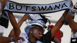 Botswana supporters cheer on their team during an African Cup of Nations soccer match in Libreville, Gabon, Wednesday, Feb. 1, 2012.