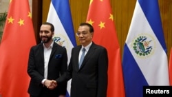 El Salvador's President Nayib Bukele meets with China's Premier Li Keqiang at the Great Hall of the People in Beijing, China, Dec. 3, 2019. 