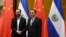 El Salvador's President Nayib Bukele meets with China's Premier Li Keqiang at the Great Hall of the People in Beijing, China, Dec. 3, 2019. 