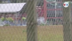 Colombia investigará a policías que se mantuvieron al margen mientras civiles disparaban contra manifestantes