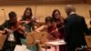 Twenty-five young musicians from around the world have gathered in California to train and perform this month. The international program called iPalpiti, from the Italian word for heartbeats, is a labor of love for a Russian-born conductor who says music can break down barriers.