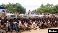 Rebels from Front for Change and Concord in Chad (FACT), captured during the fighting in the north of the country, are pictured at the army headquarters in N'Djamena, Chad, May 9, 2021. 